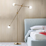 Tyalez Modern White Glass Orb Metal Swing Arm Floor Lamp
